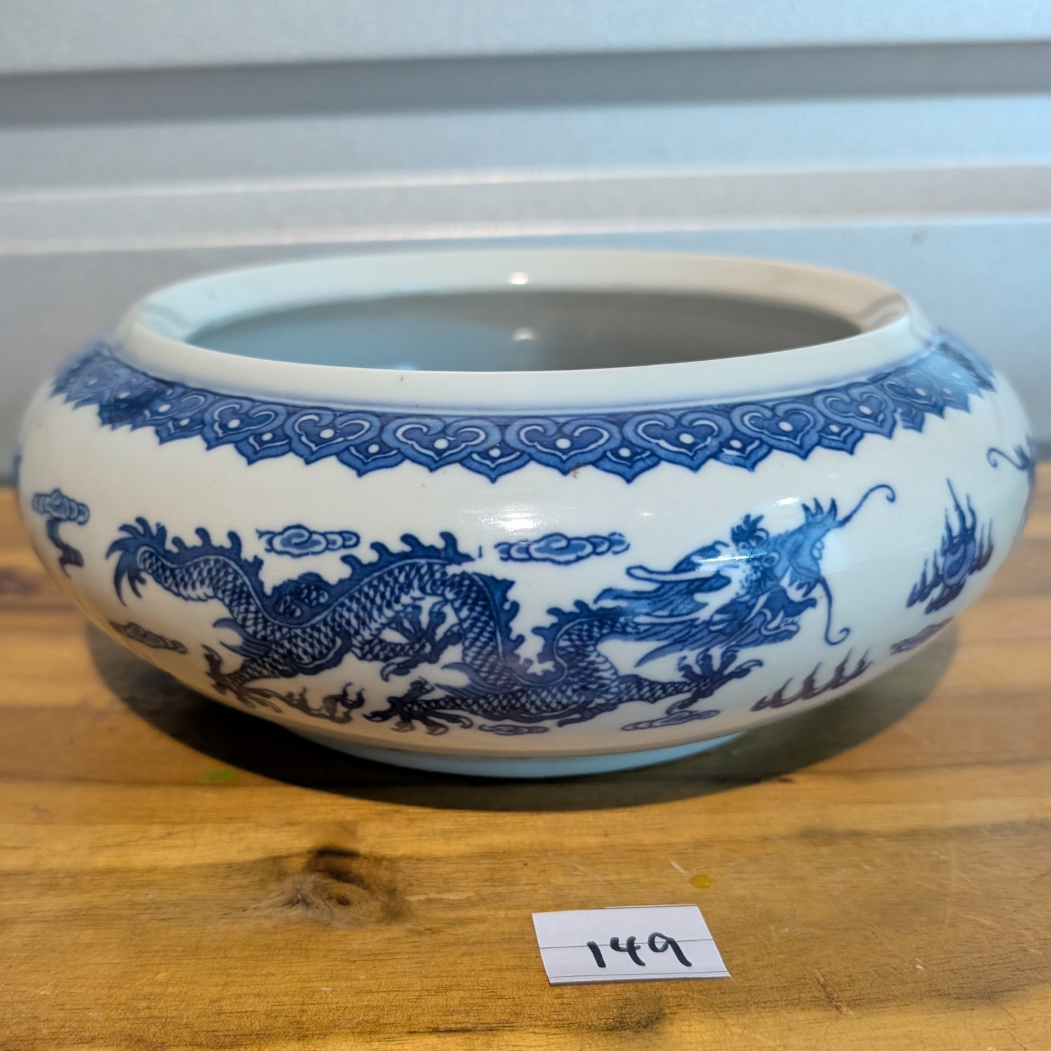 Antique Chinese porcelain bowl - blue and white with dragon motif